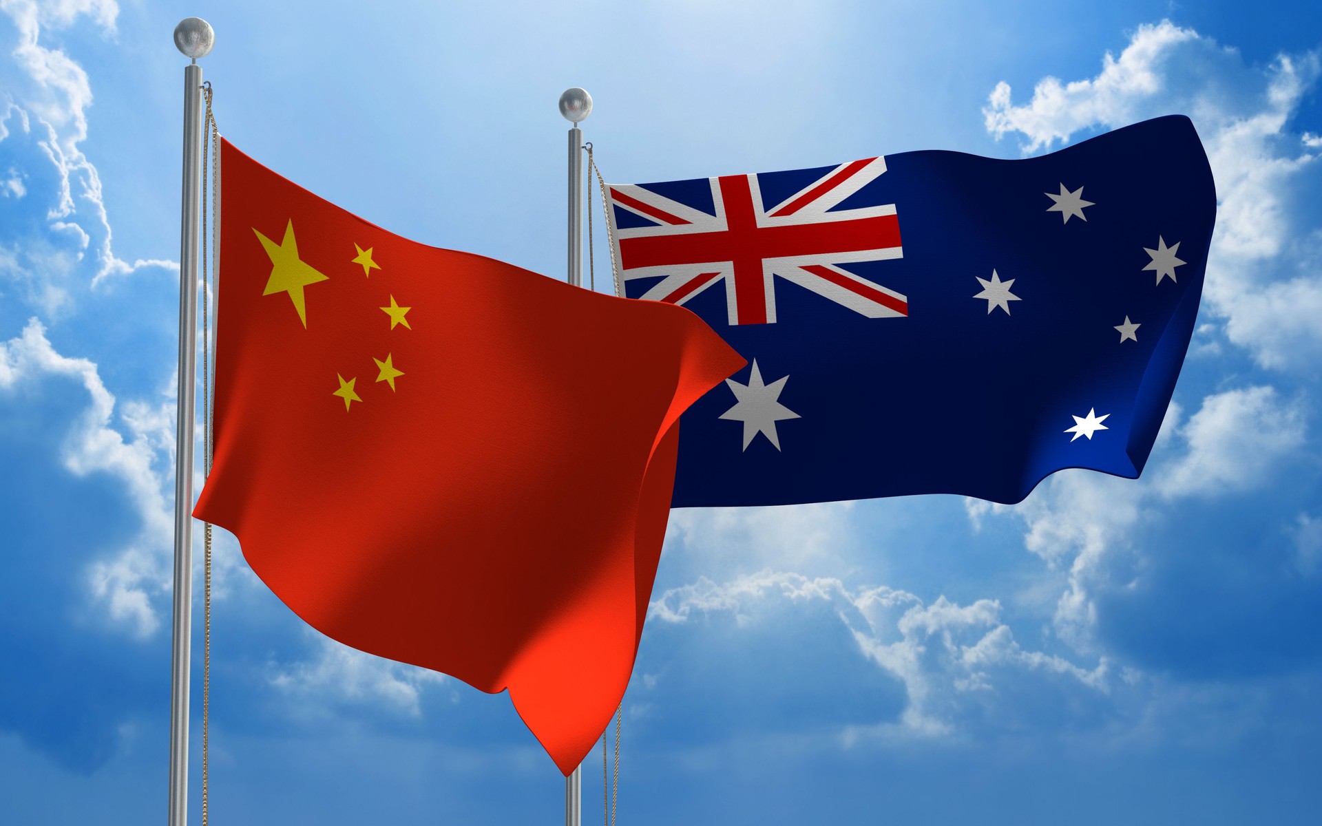 China and Australia flags flying together for diplomatic talks